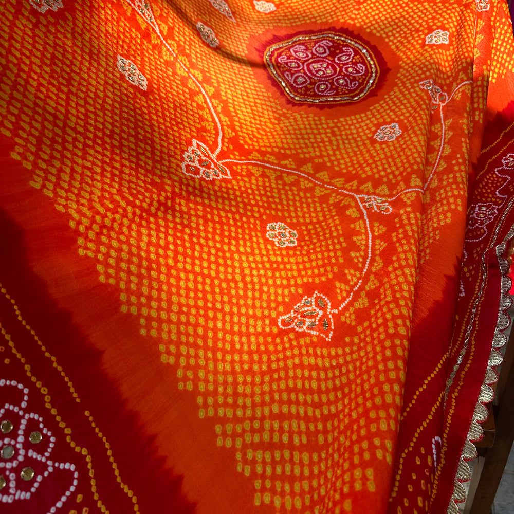 
                      
                        Orange Red Gaji Silk Bandhani Dupatta with Gota Patti
                      
                    