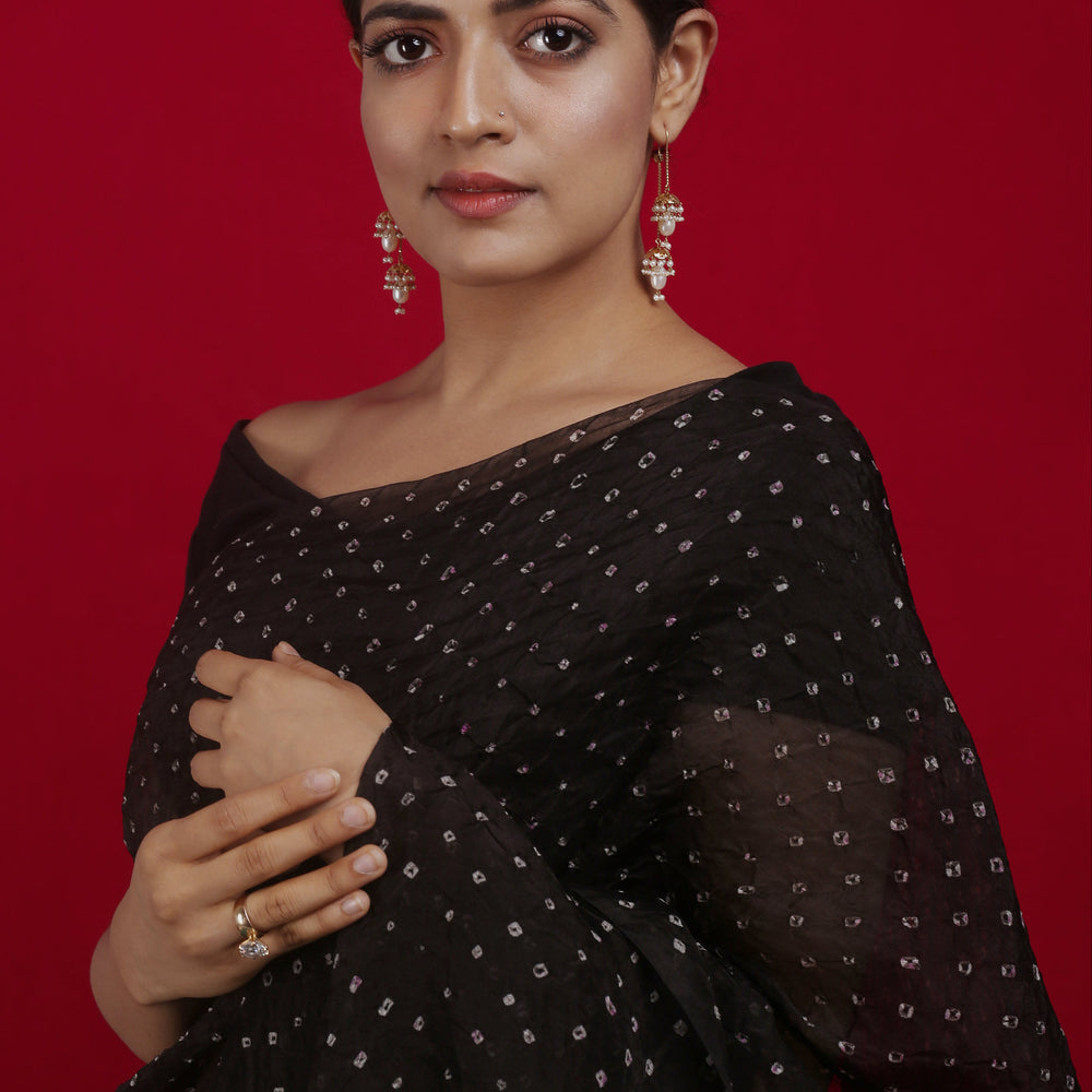 
                  
                    Bandhani on Pure Organza Saree in a Jet Black
                  
                