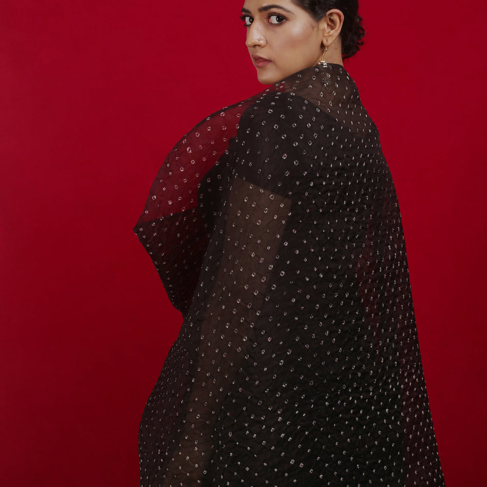
                  
                    Bandhani on Pure Organza Saree in a Jet Black
                  
                