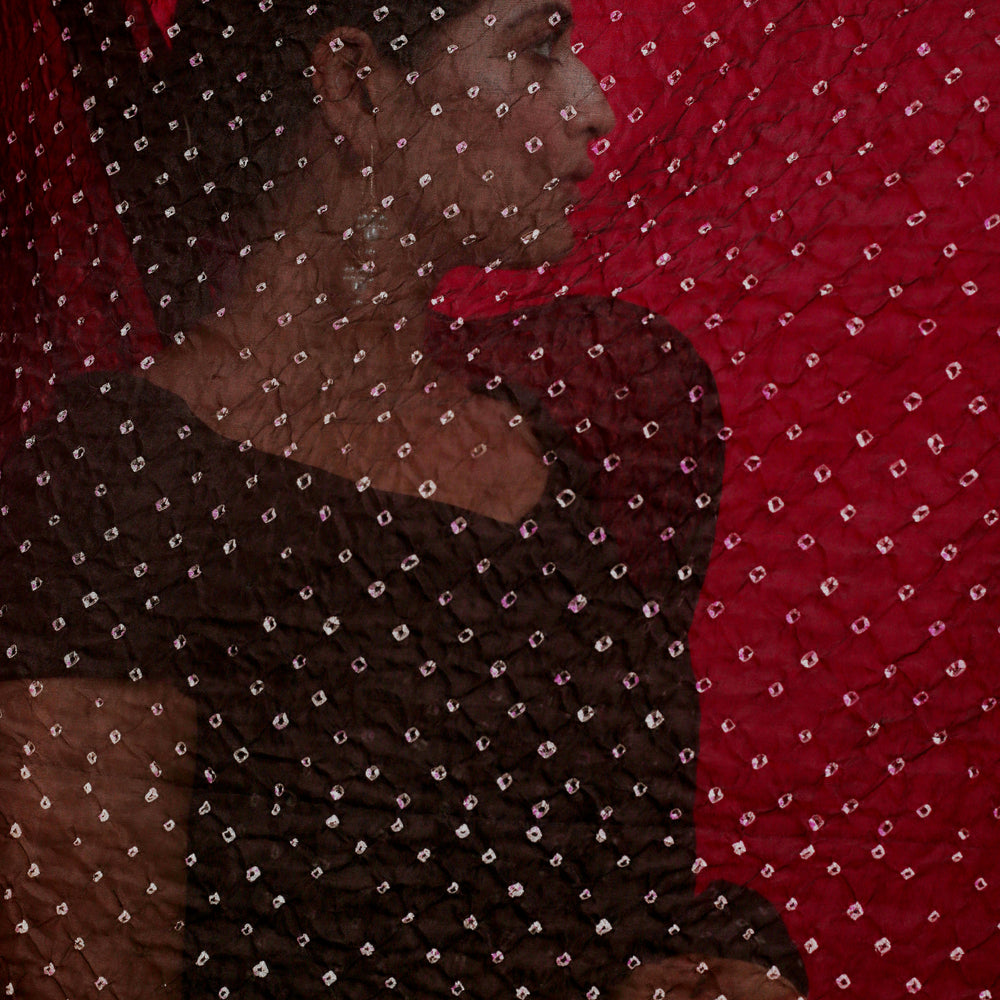 
                  
                    Bandhani on Pure Organza Saree in a Jet Black
                  
                