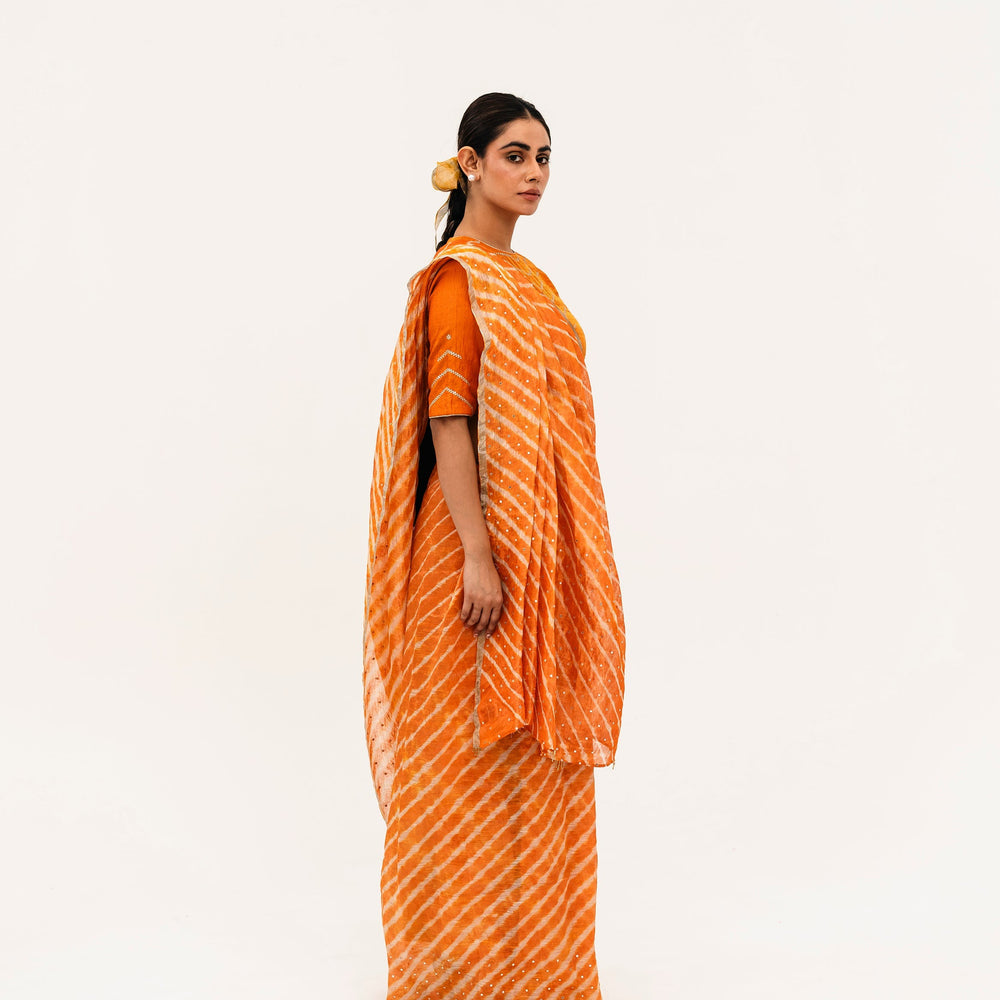 
                      
                        Luni Leheriya Saree - Orange
                      
                    