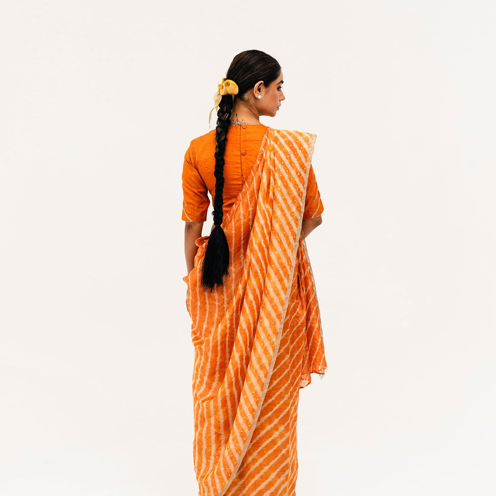 
                      
                        Luni Leheriya Saree - Orange
                      
                    