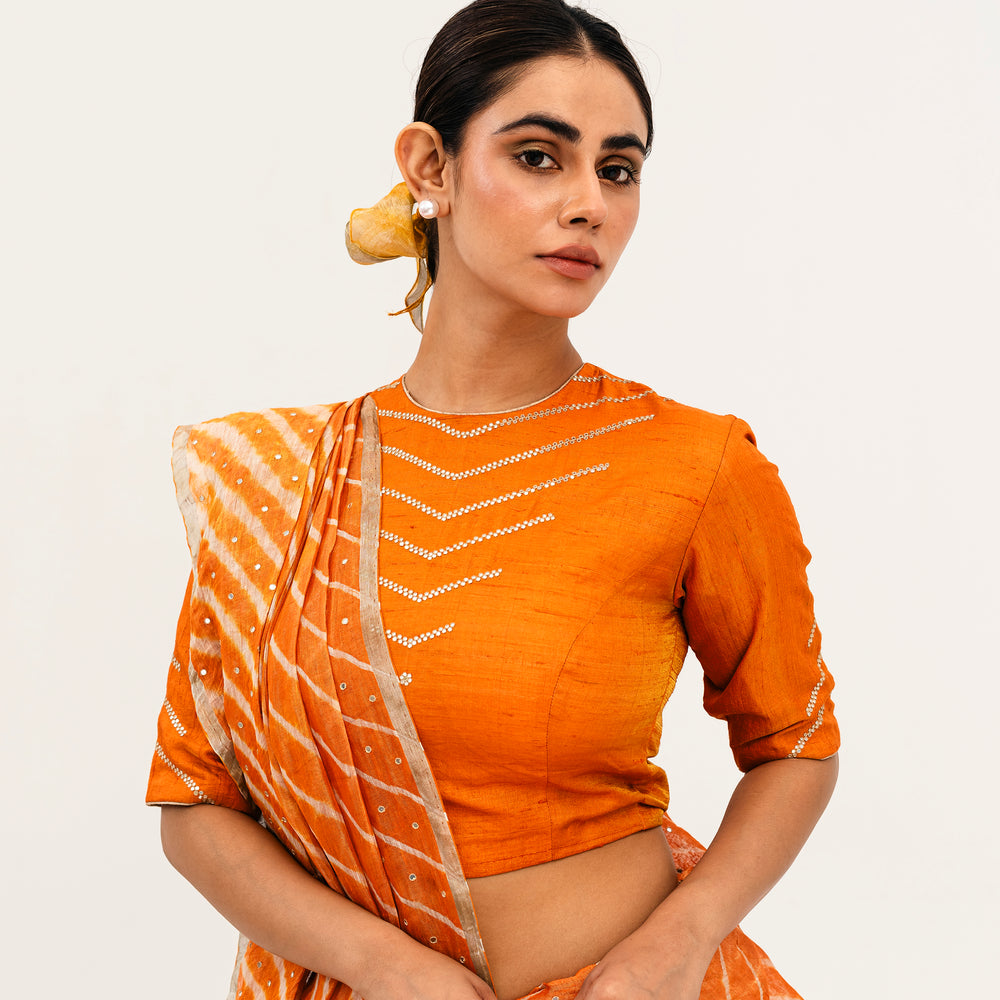 
                      
                        Luni Leheriya Saree - Orange
                      
                    