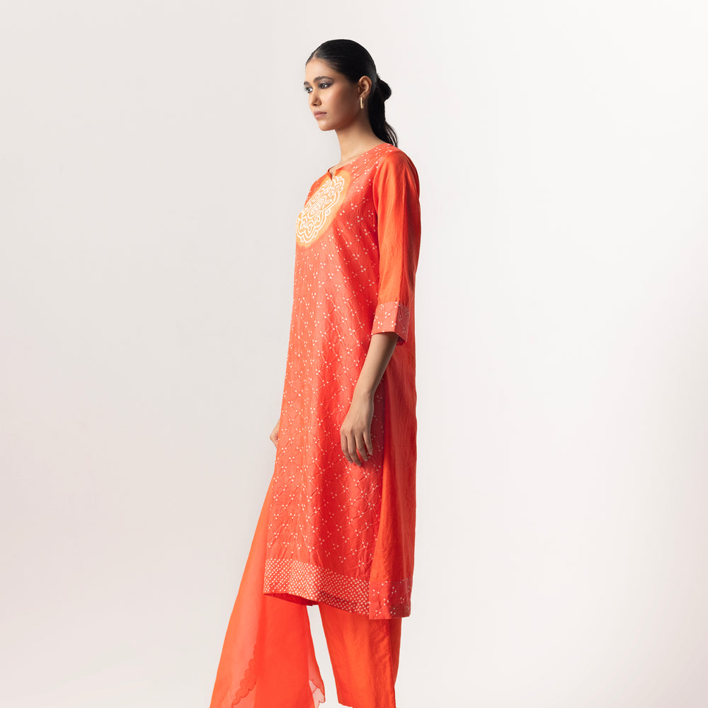 
                      
                        Circle Bandhani Suit Set By Naina Jain-Orange
                      
                    