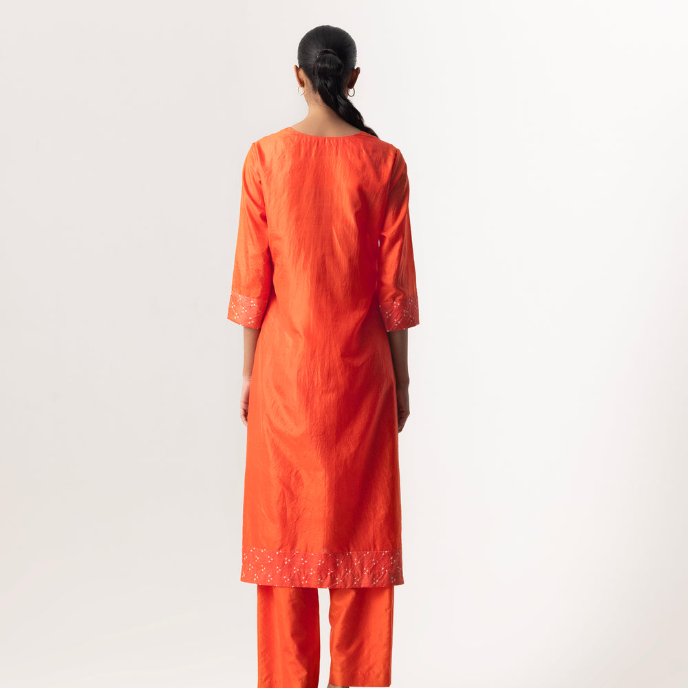 
                      
                        Circle Bandhani Suit Set By Naina Jain-Orange
                      
                    