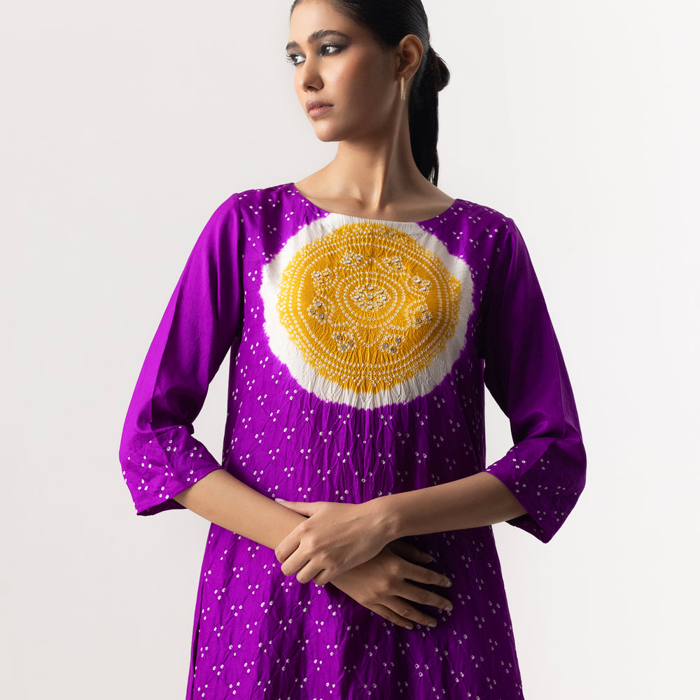 
                      
                        Bandhani Circle Suit Set By Naina Jain-Purple
                      
                    