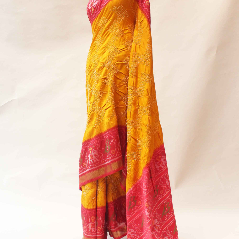 Haldi Yellow and Red Patola Border Saree with Bandhani