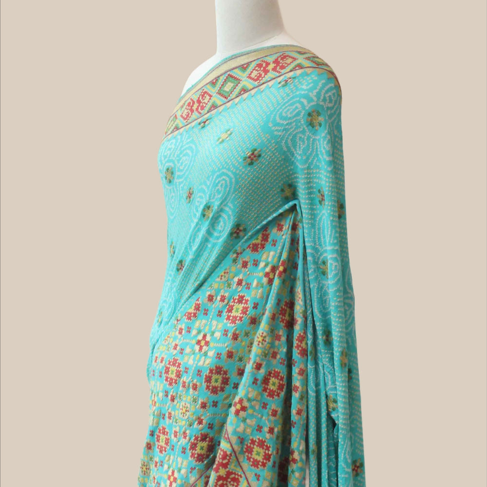 
                      
                        Banarasi Patola Bandhani Saree - Sky Blue
                      
                    