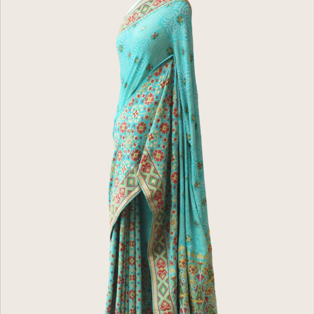 
                      
                        Banarasi Patola Bandhani Saree - Sky Blue
                      
                    