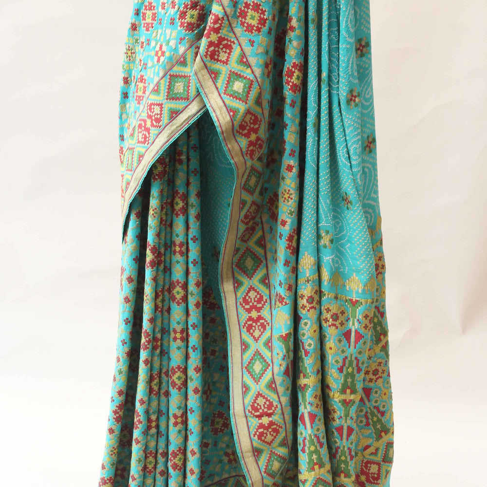 
                      
                        Banarasi Patola Bandhani Saree - Sky Blue
                      
                    