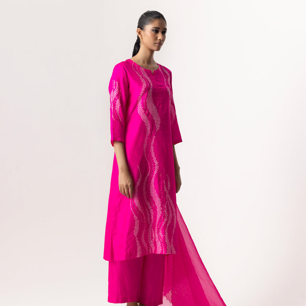 
                      
                        Bandhani Wave Suit Set By Naina Jain
                      
                    