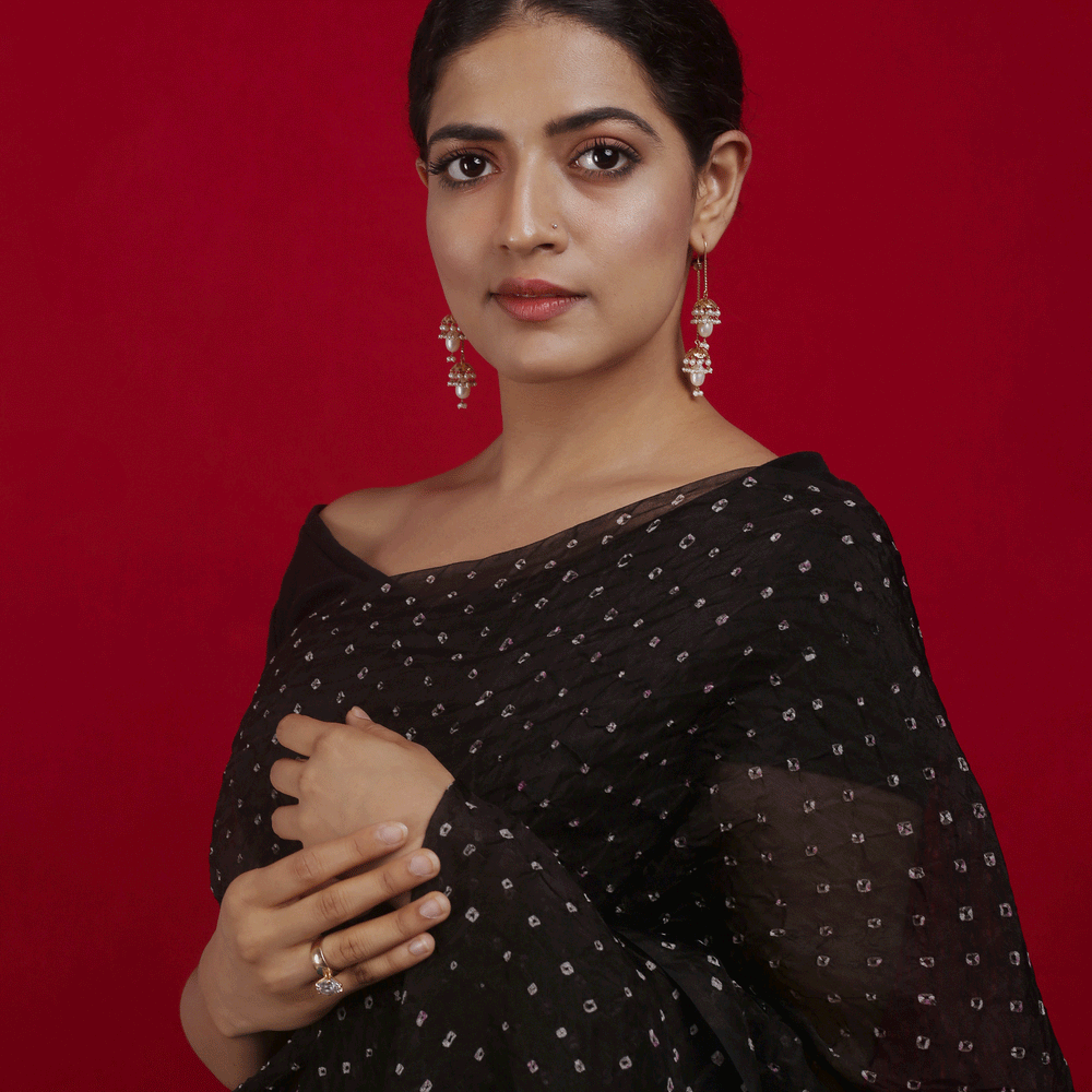 
                      
                        Bandhani on Pure Organza Saree in a Jet Black
                      
                    