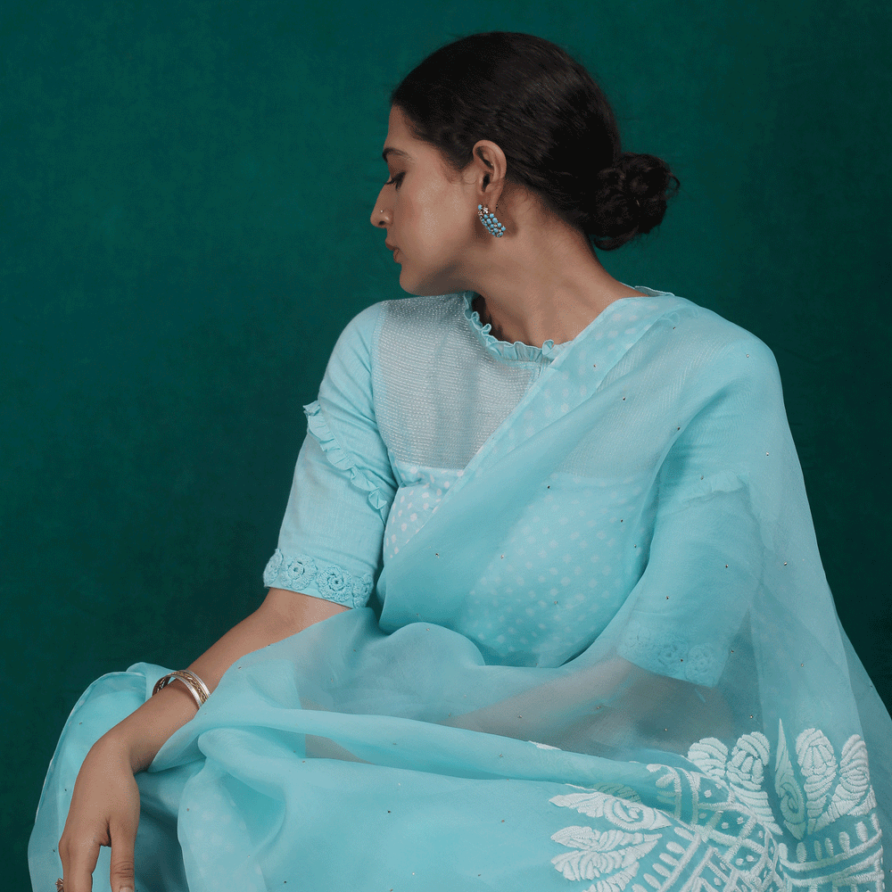 
                      
                        Sky Blue Pure Organza Saree with Rangoli Pattern on Pallu + Bandhej Blouse
                      
                    