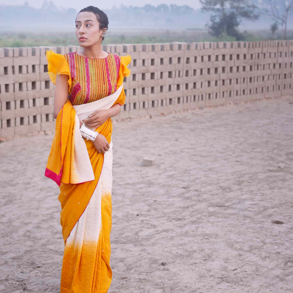 
                      
                        Haldi Yellow and Off White Shaded Silk Saree
                      
                    