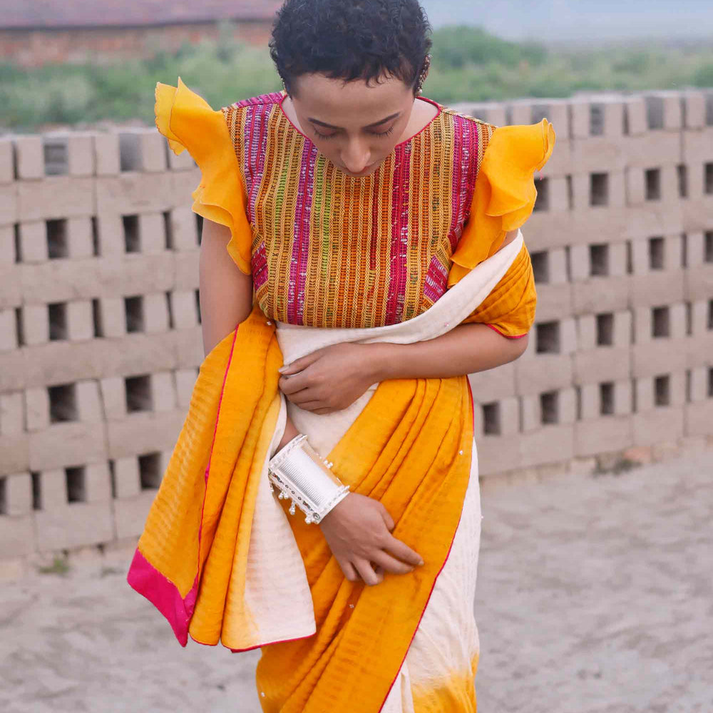 
                      
                        Haldi Yellow and Off White Shaded Silk Saree
                      
                    