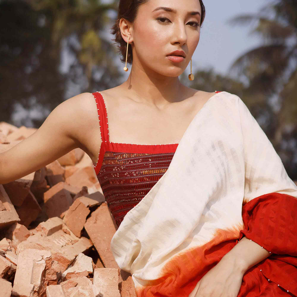 
                      
                        Brick Red Off White Shaded Silk Cotton Saree
                      
                    