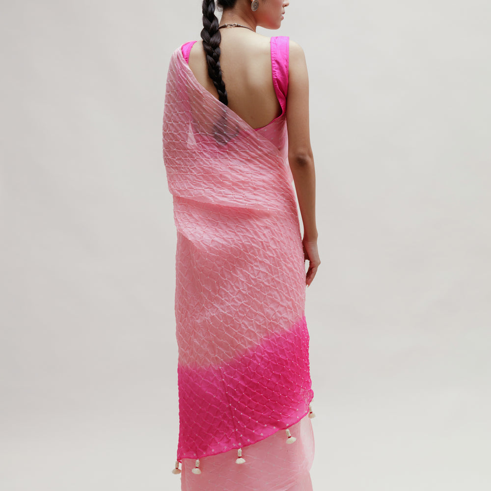 
                      
                        Bandhani on Organza Saree in Pink and Rani
                      
                    