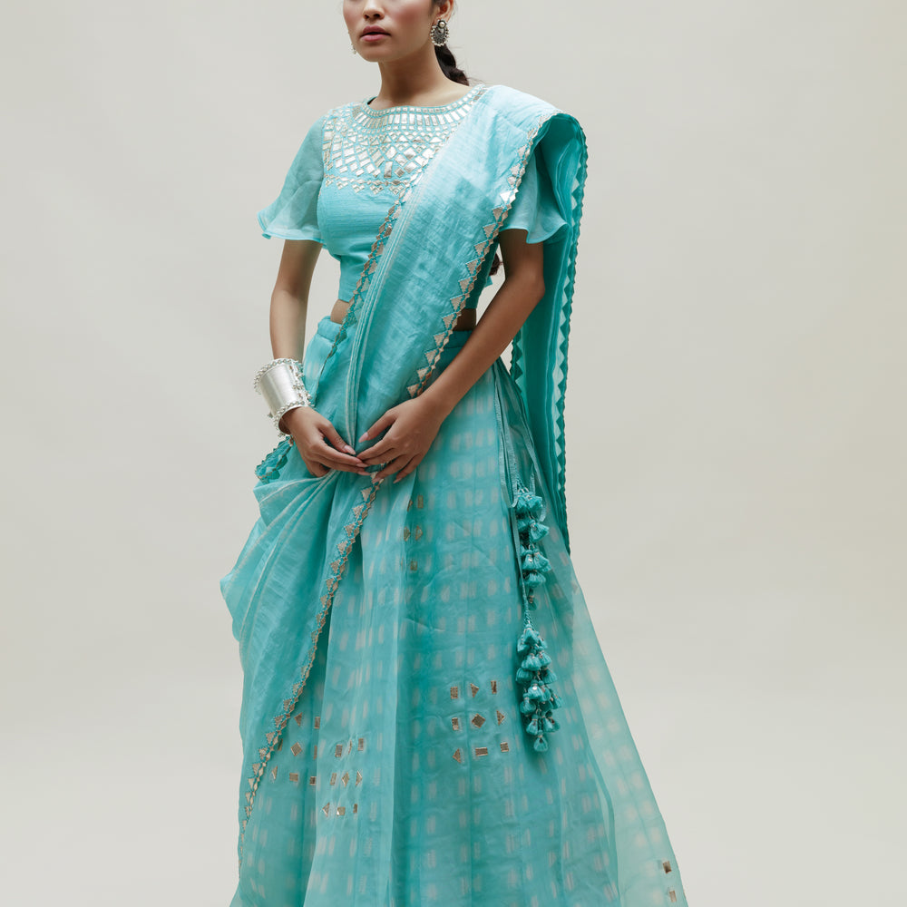 
                      
                        Clamp Dye Organza Gota Patti Lehenga Set - Sky Blue
                      
                    