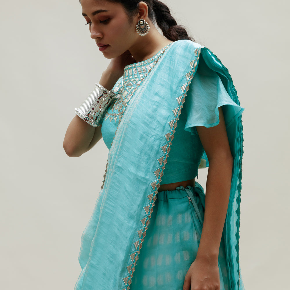 
                      
                        Clamp Dye Organza Gota Patti Lehenga Set - Sky Blue
                      
                    