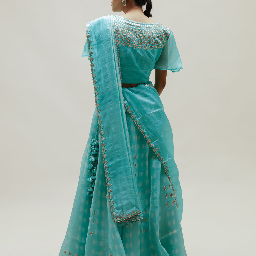 
                      
                        Clamp Dye Organza Gota Patti Lehenga Set - Sky Blue
                      
                    