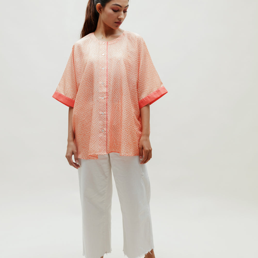 
                      
                        Peach Bandhani on Silk Shirt
                      
                    