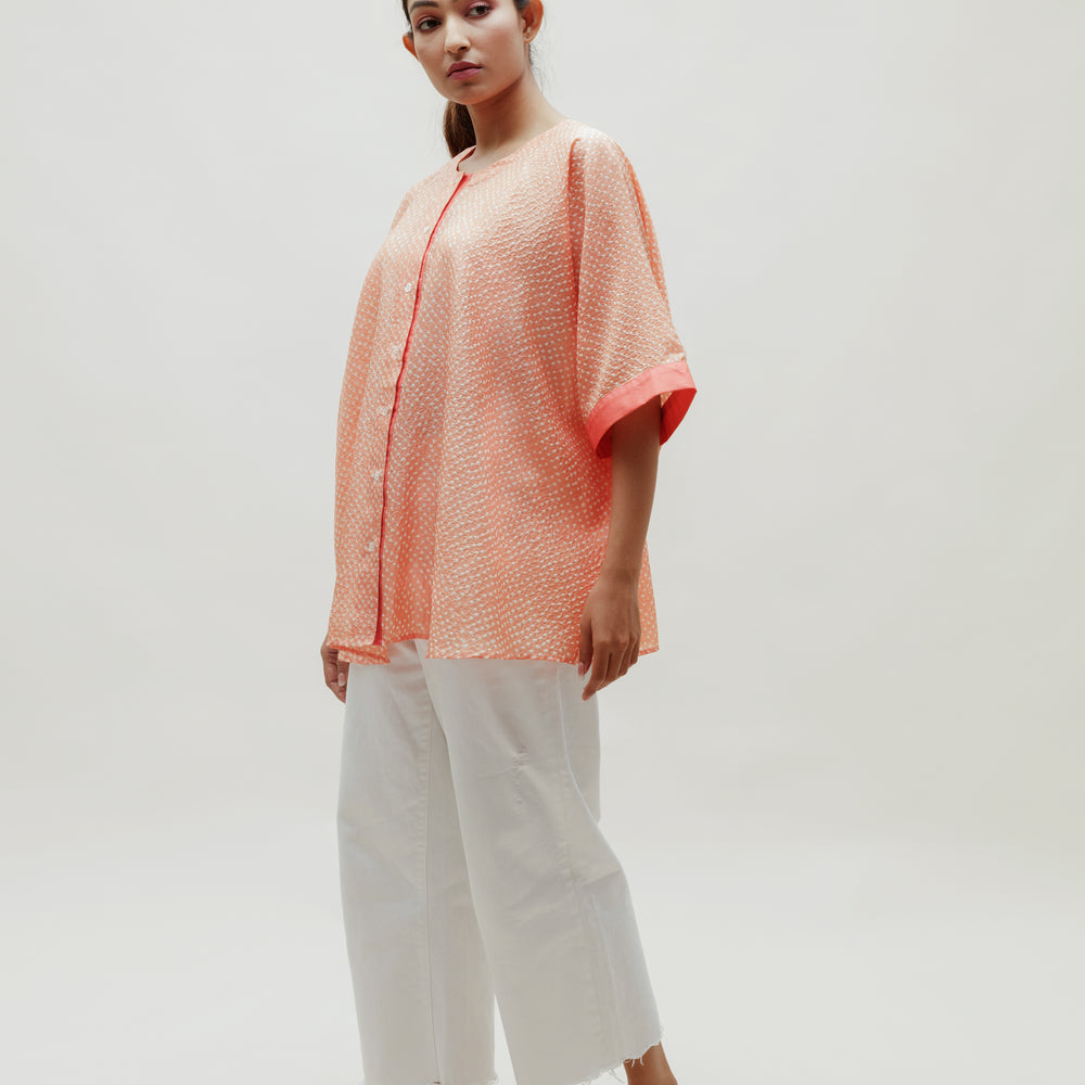 
                      
                        Peach Bandhani on Silk Shirt
                      
                    