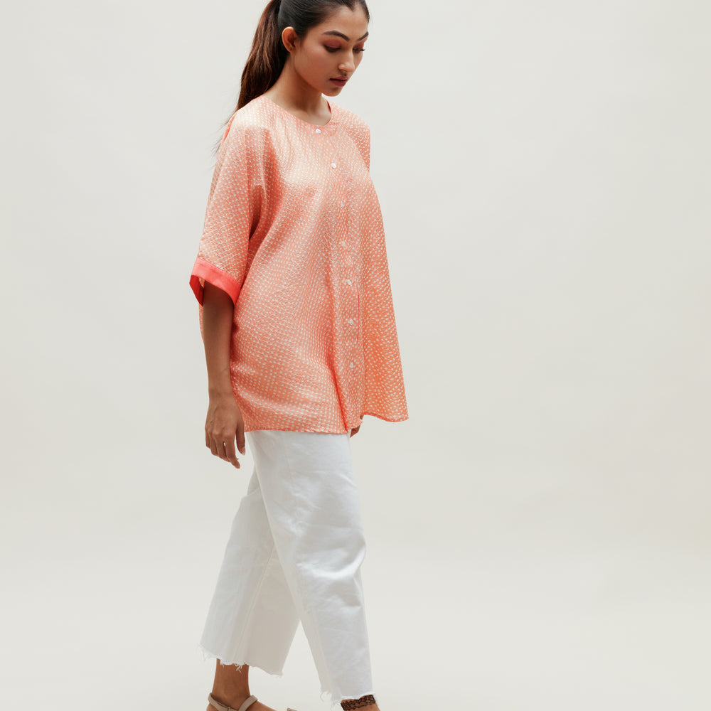 
                      
                        Peach Bandhani on Silk Shirt
                      
                    