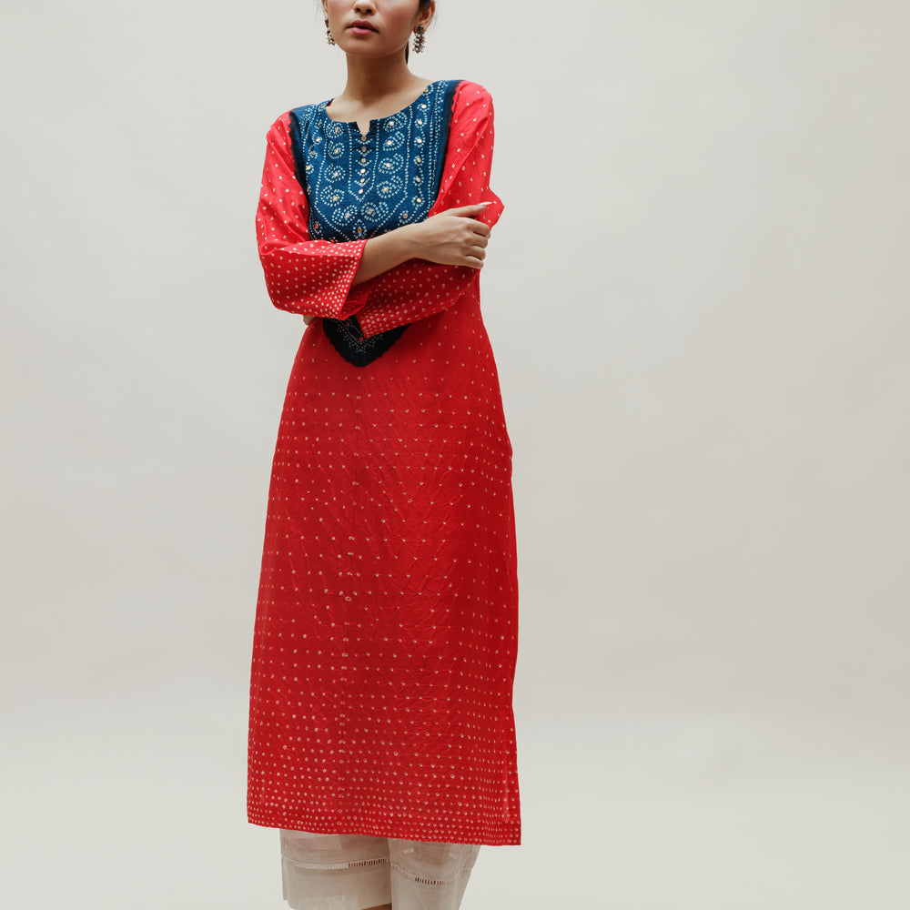 
                      
                        Bandhani Kurta on Pure Silk - Aba Yoke Blue Red
                      
                    