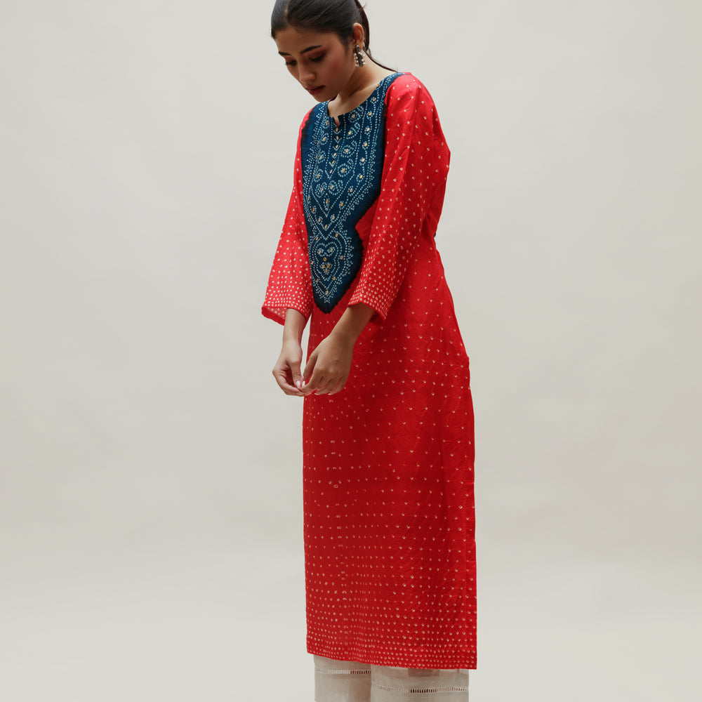 
                      
                        Bandhani Kurta on Pure Silk - Aba Yoke Blue Red
                      
                    