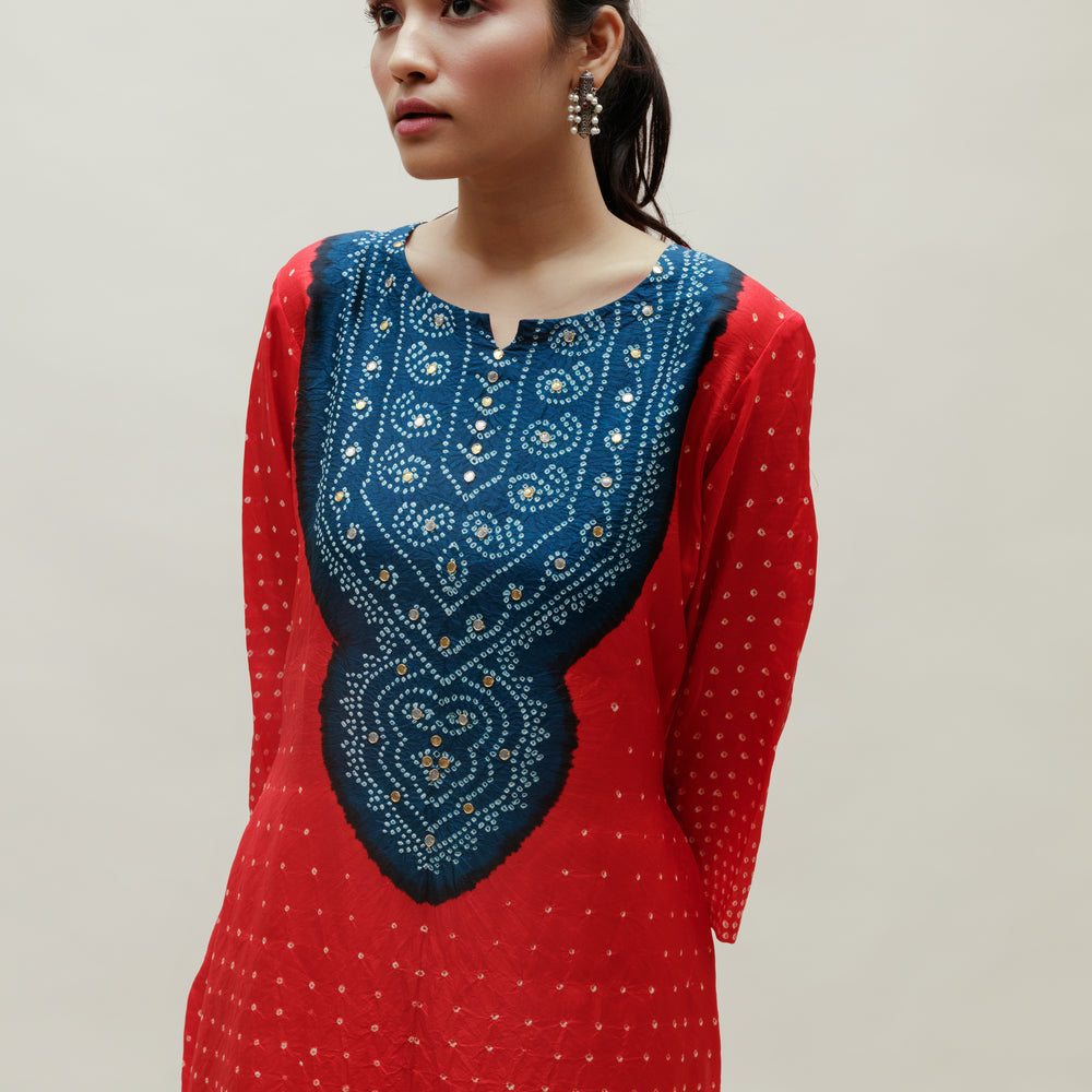 
                      
                        Bandhani Kurta on Pure Silk - Aba Yoke Blue Red
                      
                    