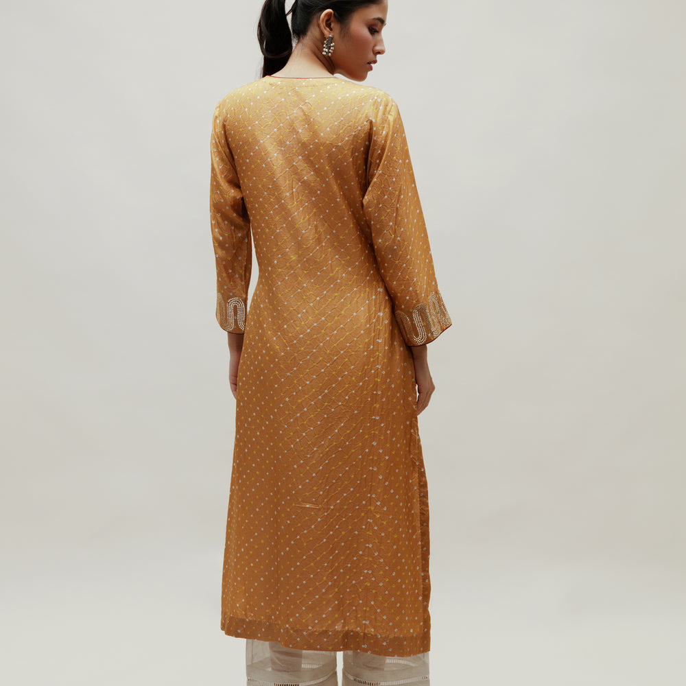 
                      
                        Beige Bandhani on Silk Kurta with Mirror Work
                      
                    