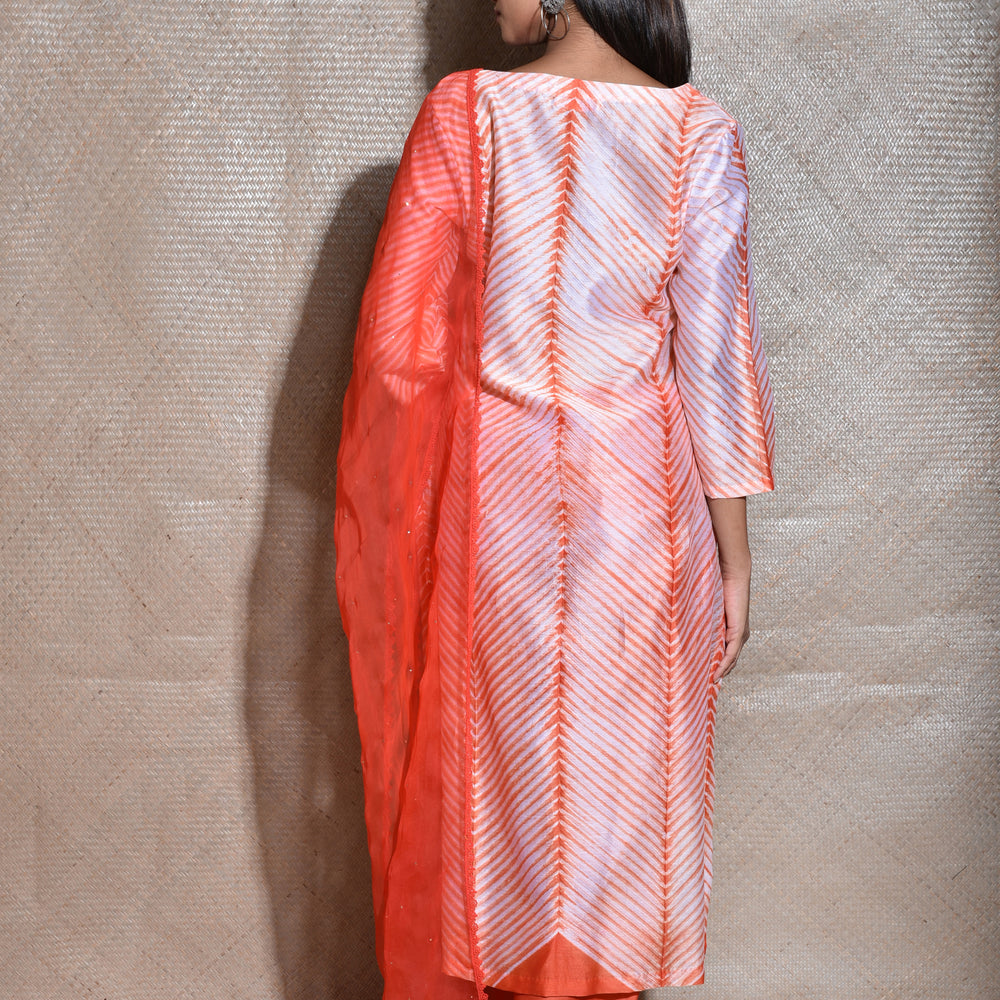 
                      
                        Arashi Chanderi Suit Set in Orange
                      
                    