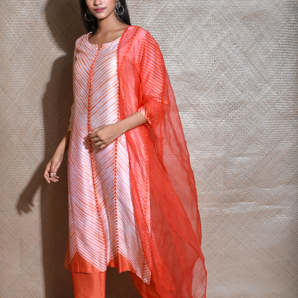 
                      
                        Arashi Chanderi Suit Set in Orange
                      
                    