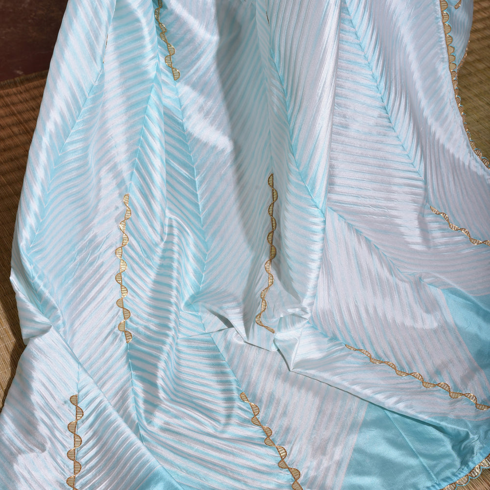 
                      
                        Arashi on Pure Silk Saree with Gota Patti - Sky Blue
                      
                    