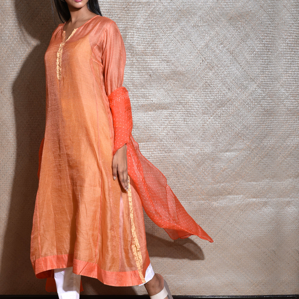 
                      
                        Bandhani on Organza Dupatta -Orange.Tissue Chanderi Kurta Set With Bandhani on Organza Dupatta -Orange.
                      
                    