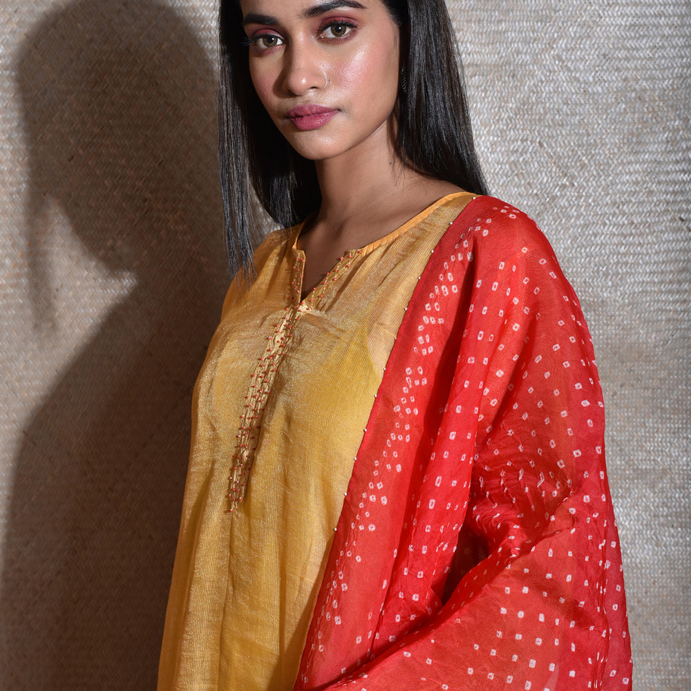 
                      
                        Tissue Chanderi Kurta Set With Bandhani on Organza Dupatta -Yellow And Red.
                      
                    