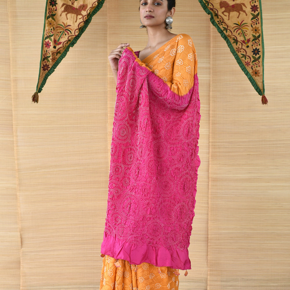 
                      
                        Bandhani on Silk Saree - Light Orange and Fuchsia
                      
                    