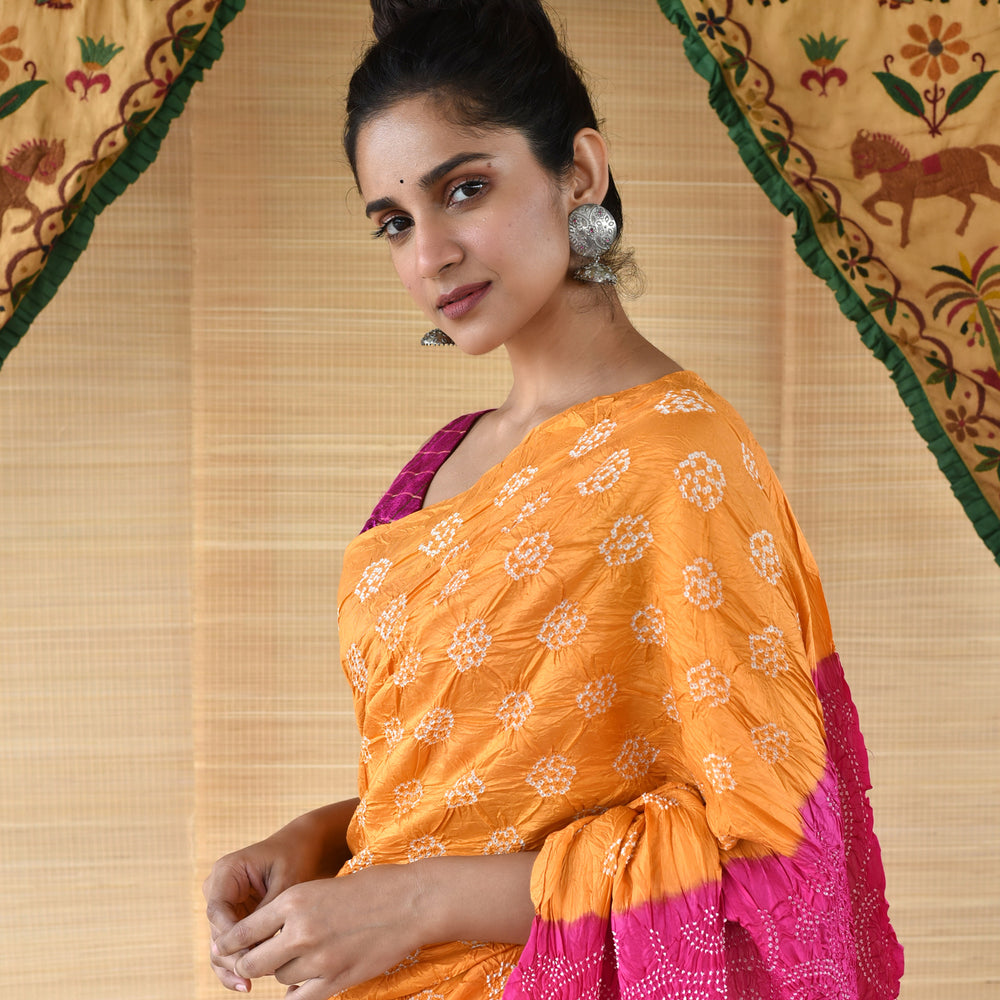 
                      
                        Bandhani on Silk Saree - Light Orange and Fuchsia
                      
                    