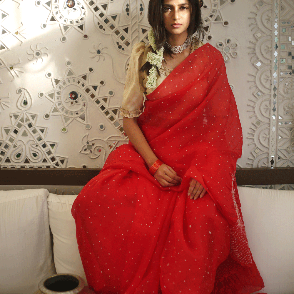 
                      
                        Bandhani on Organza Saree in a Bright Red
                      
                    