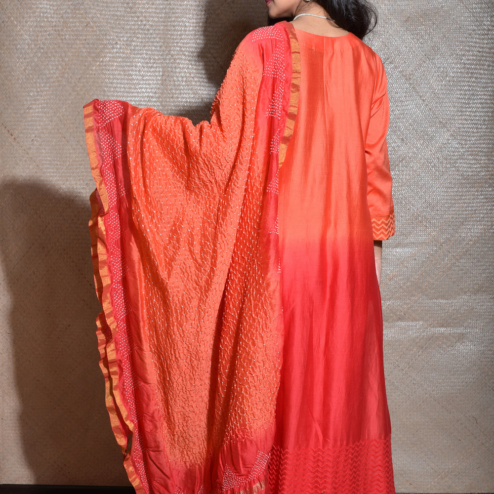 
                      
                        Chanderi Suit Set with Bandhani Dupatta -Red And Orange
                      
                    