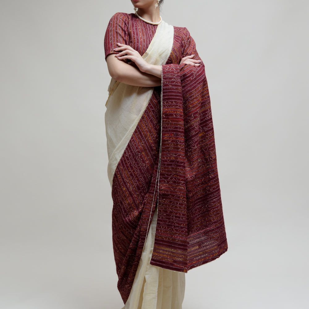 
                      
                        Off White Brown Chanderi Tissue Saree with a Unique Palla
                      
                    