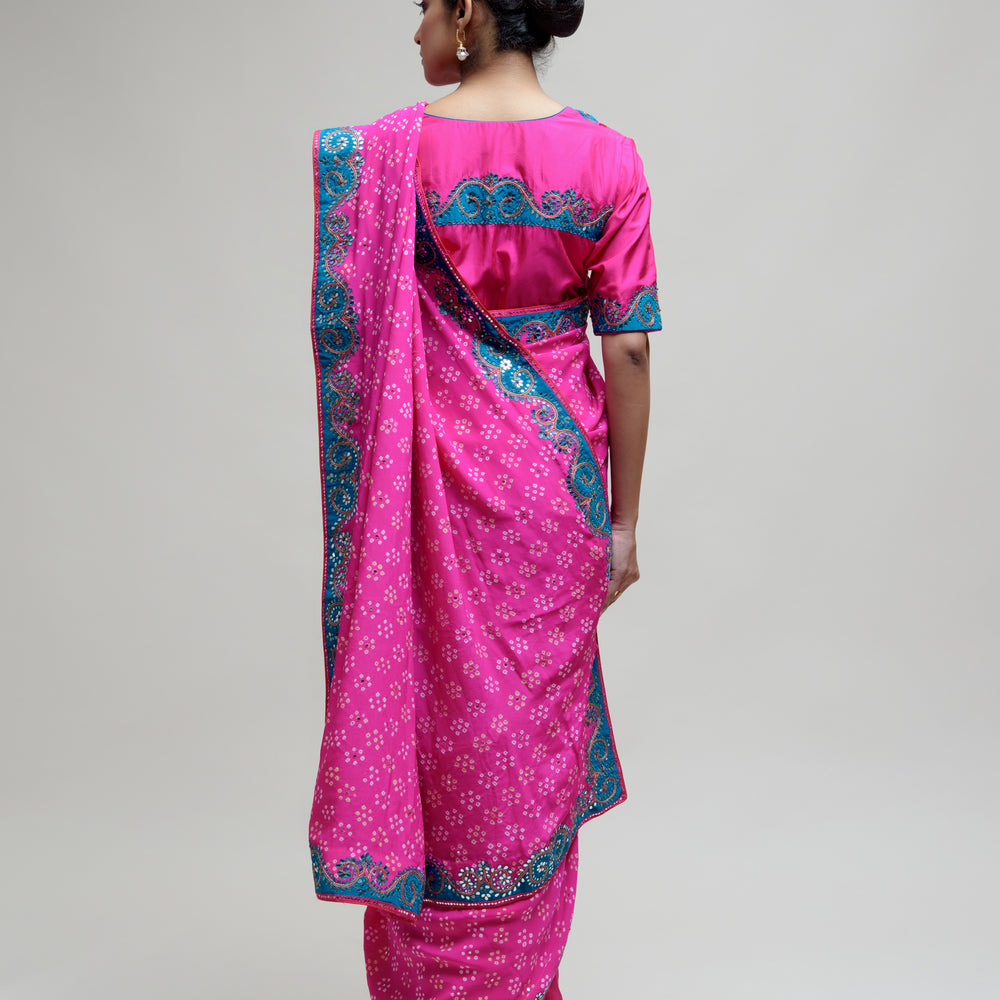 
                      
                        Hot Pink Bandhani on Crepe Saree with Mirror Work
                      
                    