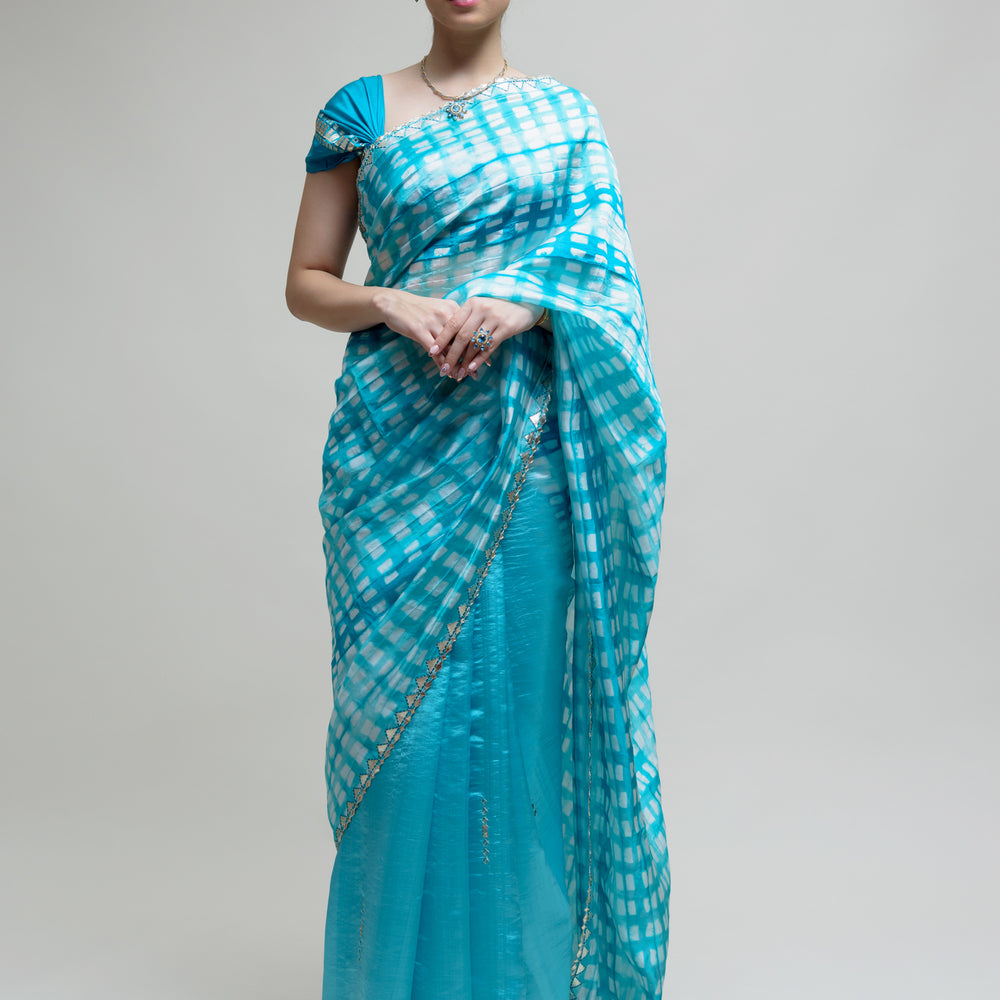 
                      
                        Clamp Dyed Chanderi Saree with Gota Patti - Blue
                      
                    