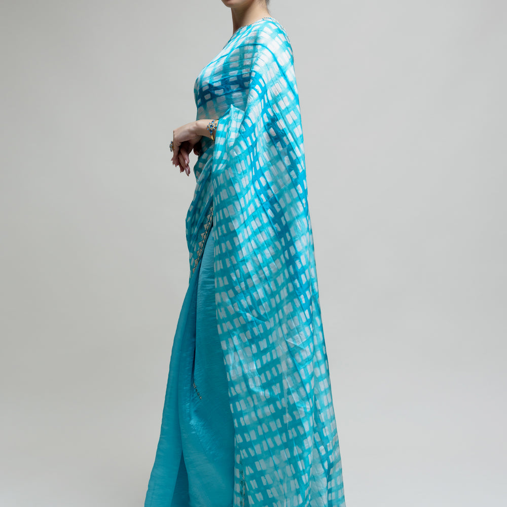 
                      
                        Clamp Dyed Chanderi Saree with Gota Patti - Blue
                      
                    