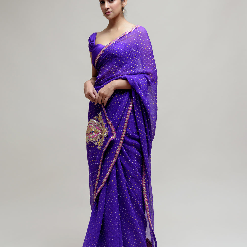 
                      
                        Purple Gota Patti Bandhani on Pure Chiffon Saree
                      
                    