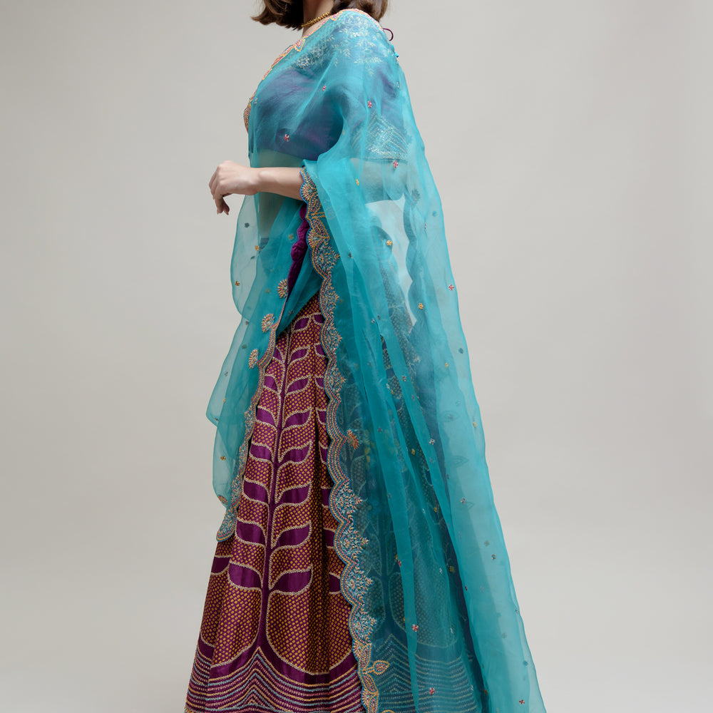 
                      
                        Ekam Lehenga - Purple Turquoise Blue
                      
                    