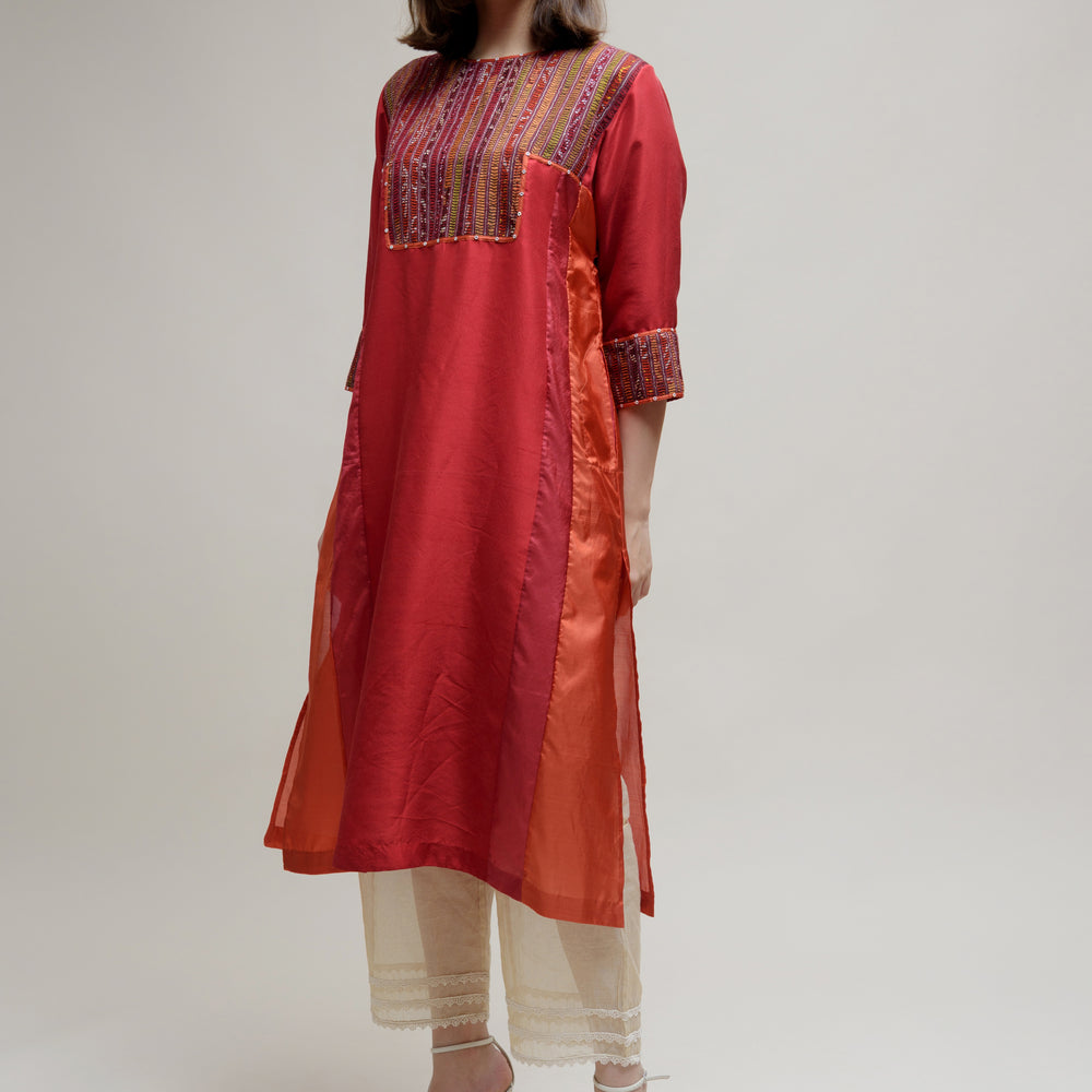 
                      
                        Brick Brown Orange Silk Kurta with a Unique Yoke
                      
                    