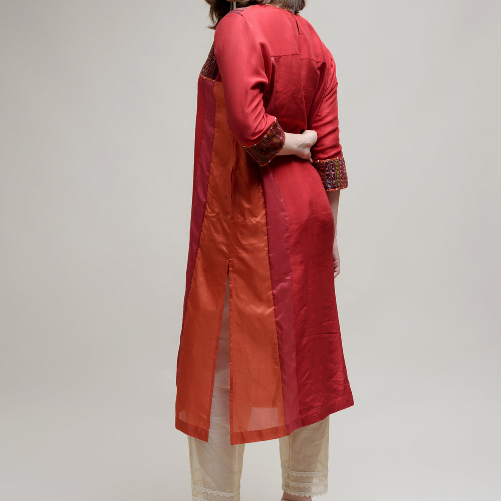 
                      
                        Brick Brown Orange Silk Kurta with a Unique Yoke
                      
                    