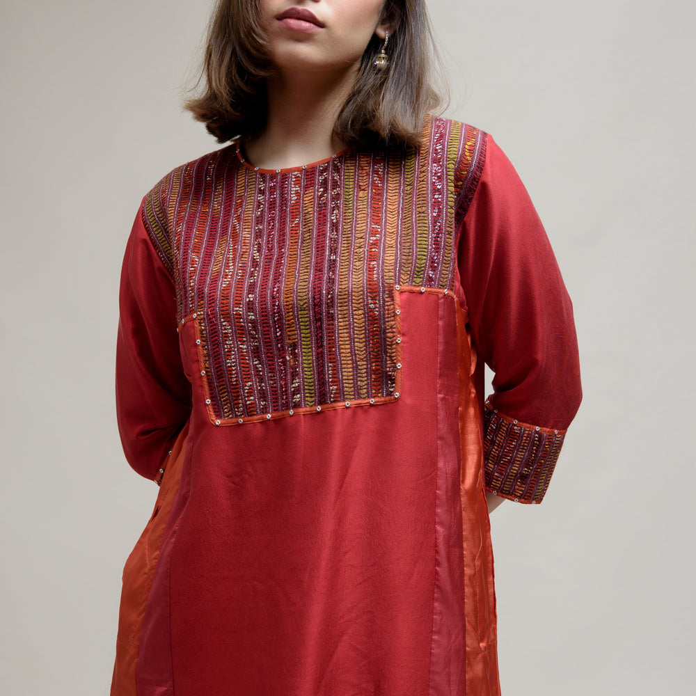 
                      
                        Brick Brown Orange Silk Kurta with a Unique Yoke
                      
                    