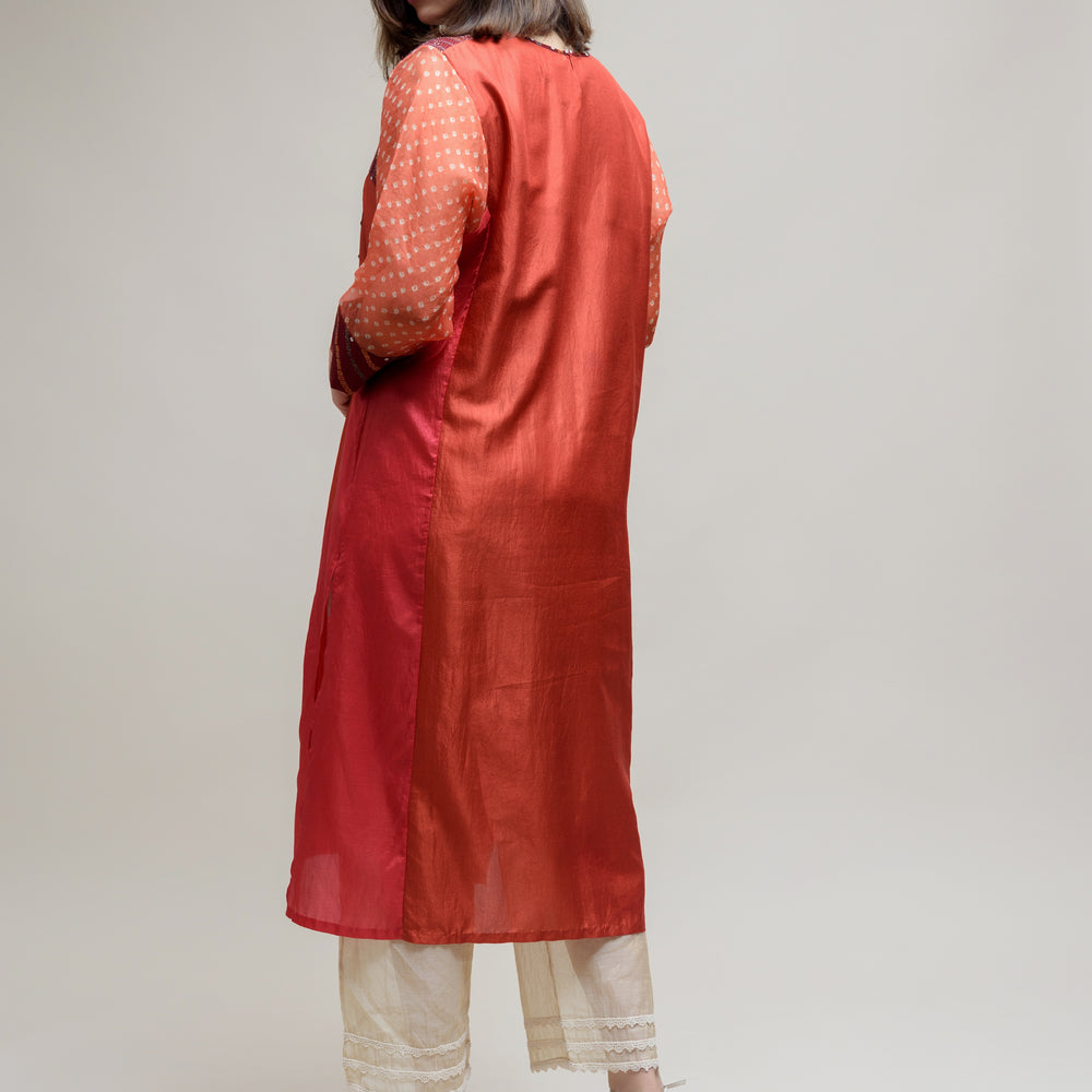 
                      
                        Brick Brown Orange Silk Organza Kurta with a Unique Yoke
                      
                    